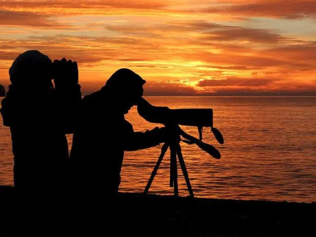 Men watching the sunset
