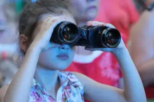 little girl with binoculars