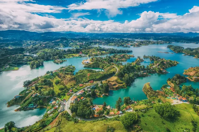 A beautiful scene with green waterways and small villages.