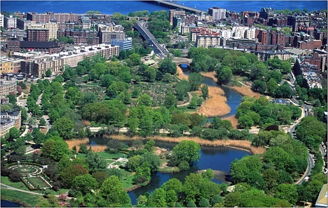 Arial shot of a series of lakes and woods.